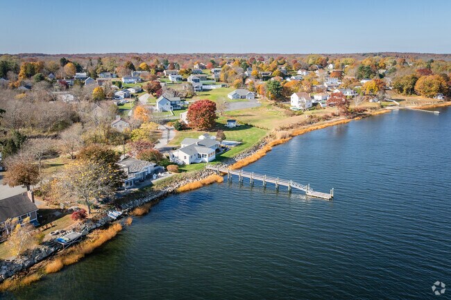 Take in this stunning aerial view of waterfront homes in Somerset Historic Village, MA.