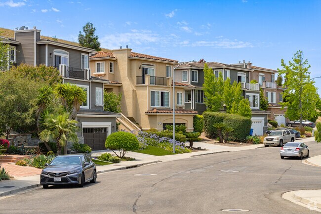 The homes that were built up against the Islay Hill are two-story and have small front yards.