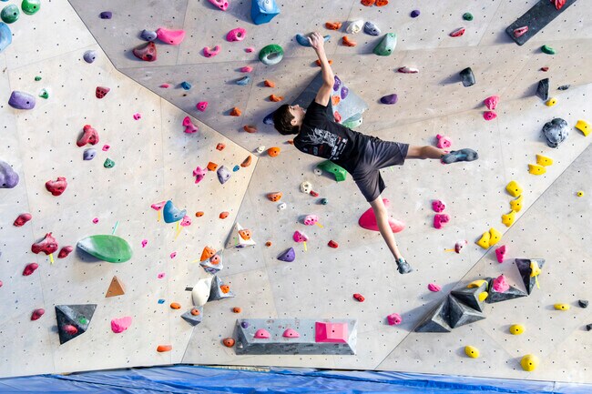 Rock climbing is possible in Texas at Climb Woodlands near Pinehurst.