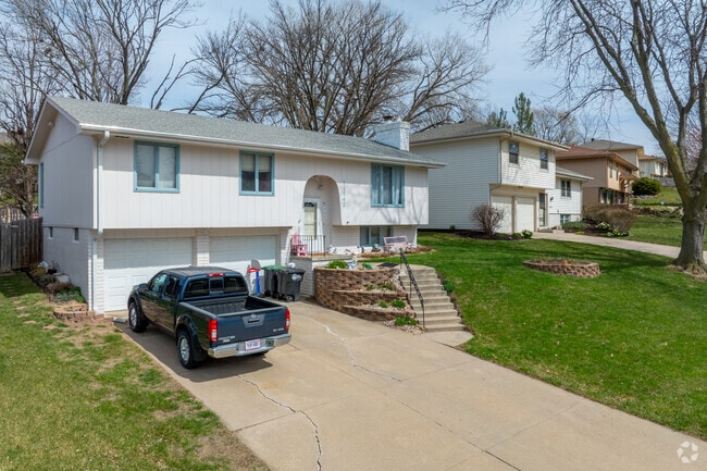 Well-groomed yards and mature trees line the streets of Disney.