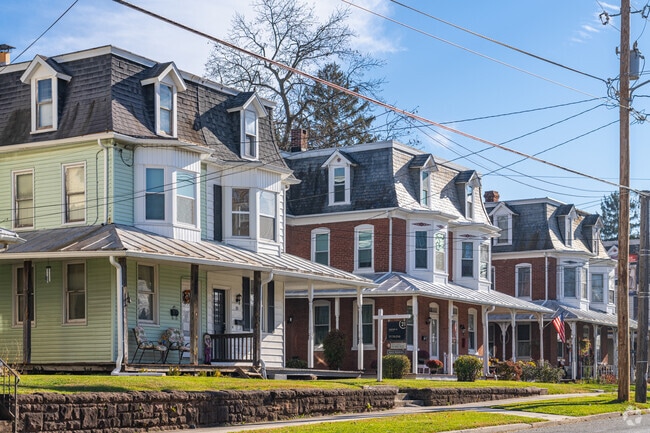 Rows of historic three story townhomes sit along Main St in Dover.