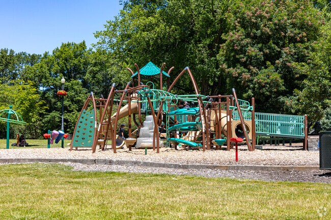 Enjoy picnics and leisure at Lake Sacajawea East Play Area, surrounded by lush greenery.