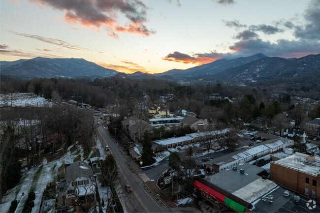 The sun sets behind the Smoky Mountains to the West of Waynesville.