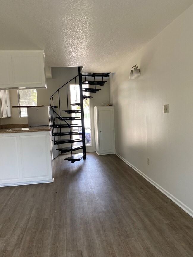 sprial straircase to bedroom and bath