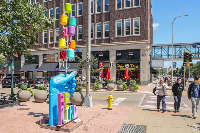Downtown Sioux Falls buzzes with activity in summer just minutes from Oak View.