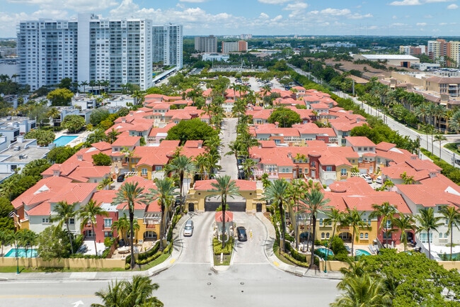 Terracotta-hued condos huddle together on Williams Island.