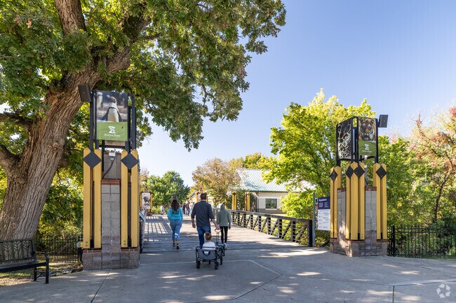 Stroll among the tigers, rhinos, & grizzly bears at the Tulsa Zoo near Raceway neighborhood.