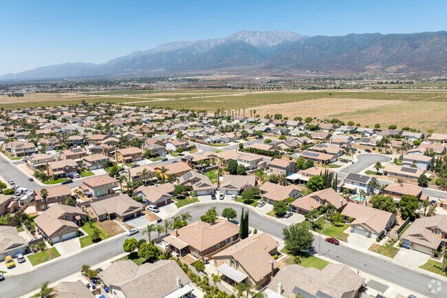 Morningside overlooks a fruit field and beautiful mountains.