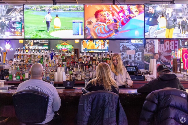 Enjoy cheers to fun and friends at The Caddy Shack Sports Bar & Grill near Mission park.