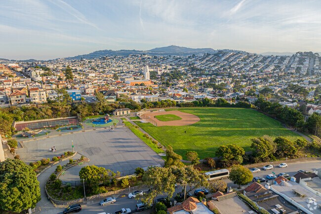 Capture the beauty of Aptos Park from above with a stunning aerial view of the landscape.