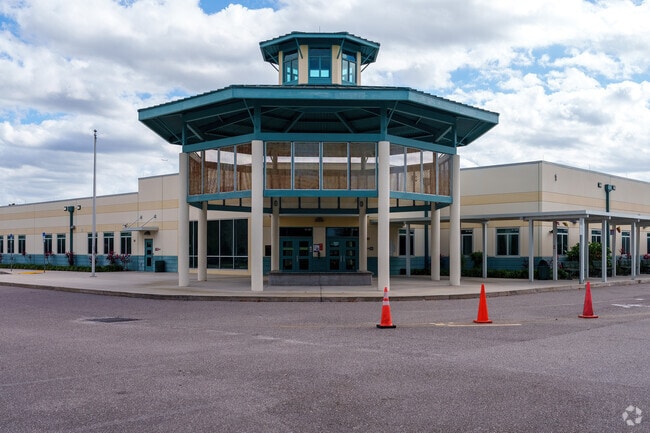 A sizable pavilion offers shelter for drop-off at Azalea Park Elementary School.