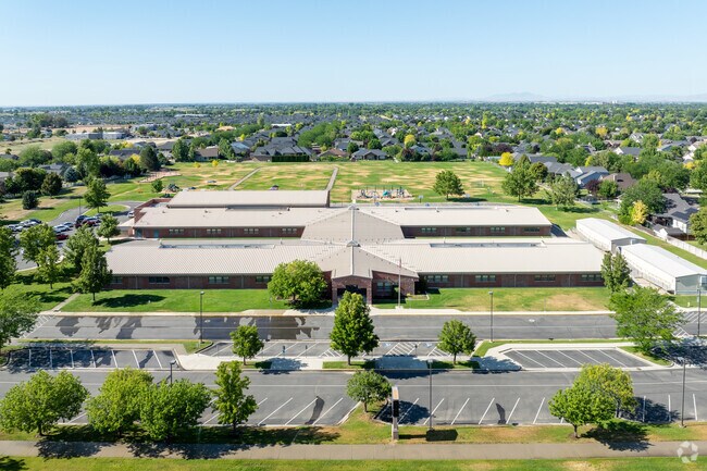 Students enjoy the open courts and acres of green space at Owyhee Elementary for recess.