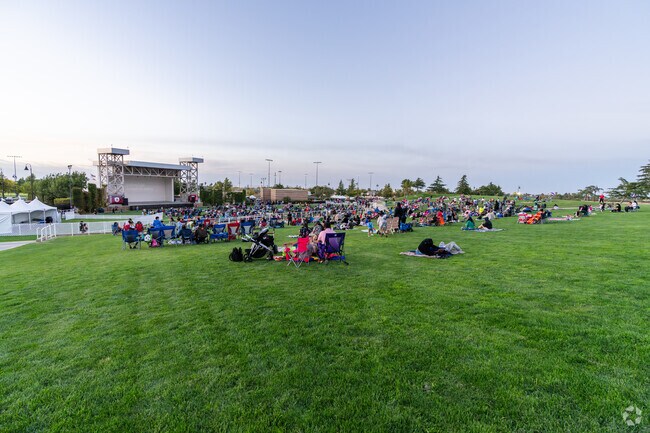 The amphitheater starts to fill up for the Family Movie Night event.