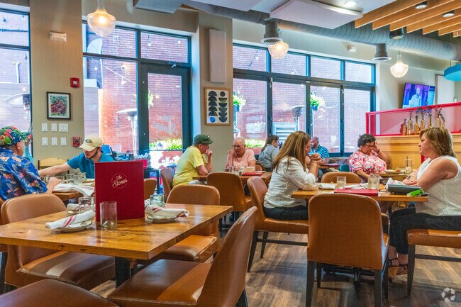 Enjoy the comfortable ambiance and delicious food inside The Stones Common House near Lindenwood.