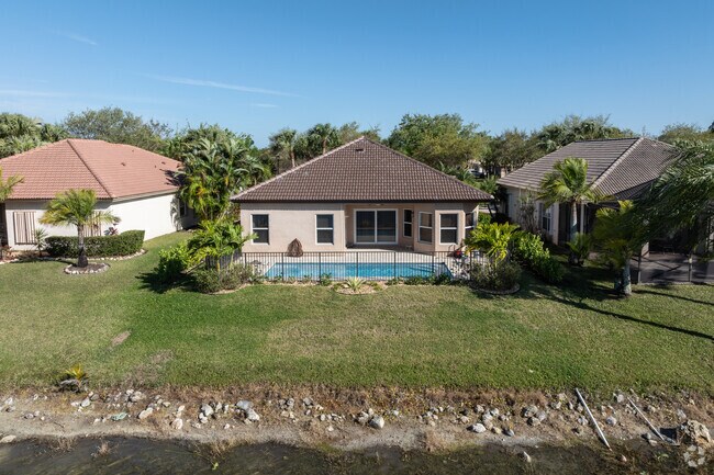 Most homes in Parkland Isles have backyard pools.