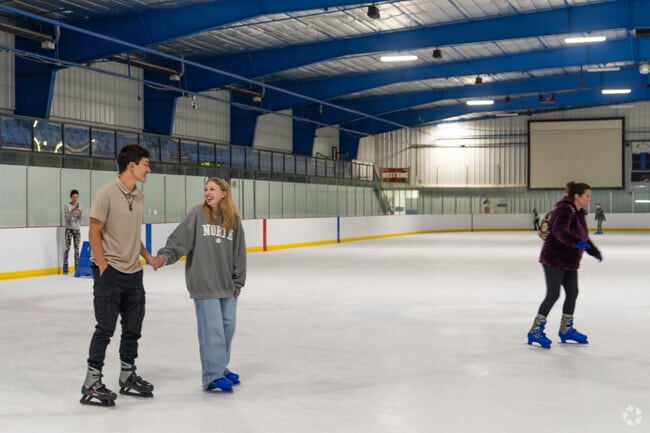 Skaters perfect their moves at the Arctic Edge Ice Arena.