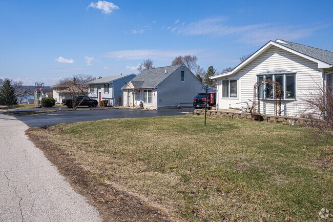 Workers' cottages and split-level homes dot the residential streets in Shore Hills.