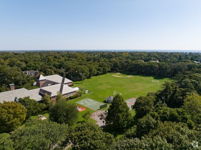 Quogue Elementary School has a big open field behind the school.