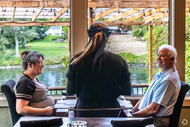 River’s Edge Restaurant overlooks the Rogue river and serves steak, pasta and cocktails.