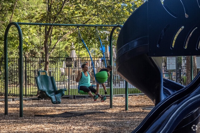 Families gather at Valley Ranch Recreation Center to enjoy the playground.