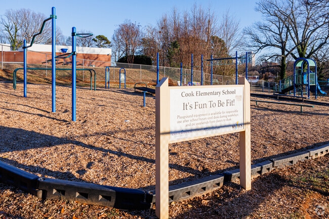 Cook Literacy Model School has separate playground areas for different age groups.