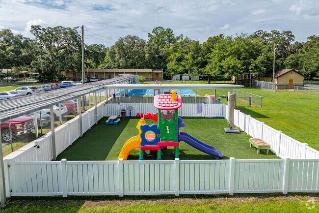Kids enjoy playing on the play area at Brooksville Engineering, Science And Technology.