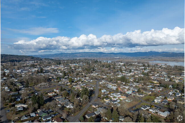 Beautiful homes and trees line the streets of the city of Saint Helen.