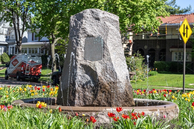 Tulips surround the Peavey Fountain, dedicated to the horses of the 151st Field Artillery.