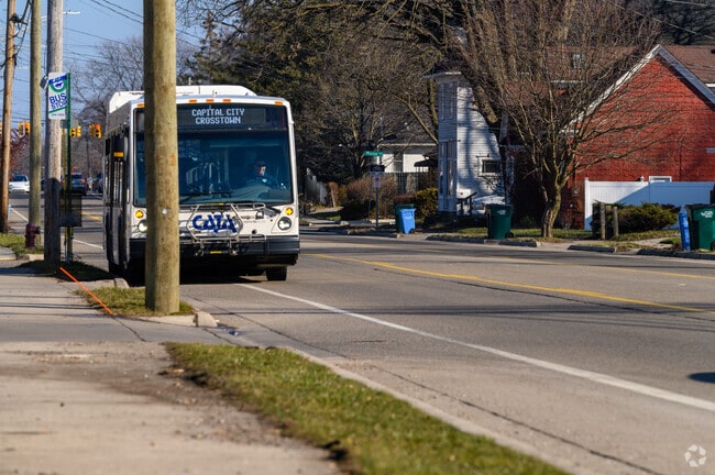 The CATA bus system entends throughout Lansing and has multiple stops in Moores Park.