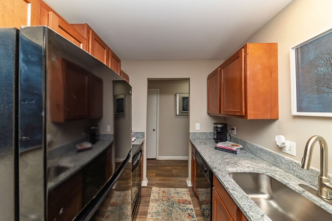 Step into this contemporary kitchen, where style meets functionality.