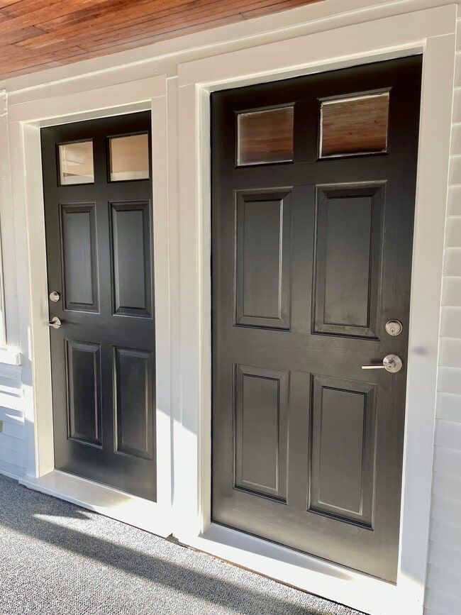 Each unit has its own entrance from the shared sunporch as well as private side entrances.