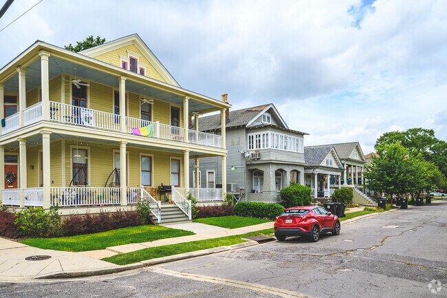 The Freret neighborhood also features some two-story builds with cozy front porches.