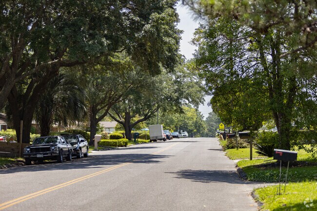 The streets of Cloverdale are lined with lush trees and large front yards.