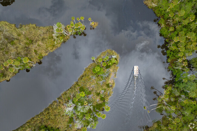Glide across the glass like water on the Cotee river in New Port Richey South.