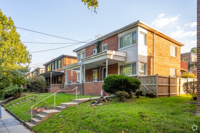 A line of classic brick detached row homes in Pleasant Hill.