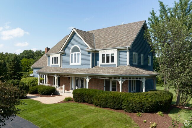 Expansive homes with classic styles are found in Whispering Trail.