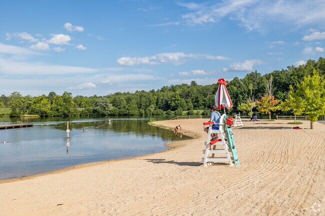 The beach at Chris Greene Lake Park offers Hollymead locals a spot for sunbathing and swimming.