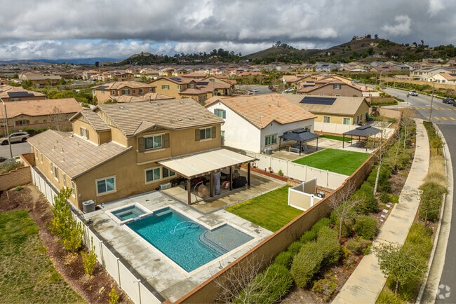 Dive into comfort with spacious homes and pools at Audie Murphy Ranch in Menifee.
