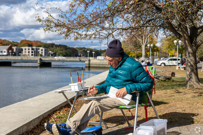 A talented artist captures the beauty of Saugatuck River, turning nature into a canvas.