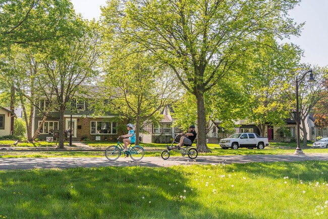 A family of cyclists make their way along Victory Memorial Parkway.