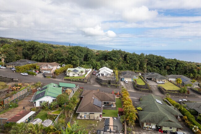 Kealakekua, HI boasts stunning views of the coastline and lush, green hills.