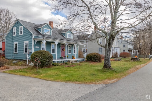 A row of classic historic homes in the town center of Dunbarton adds charm and appeal.