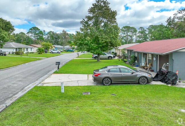 Aspen Court, in Greater Daytona, sits right on the edge of Tiger Bay State Forest.