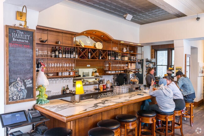 The Harriet Brasserie has a bar and restaurant seating and serves new american cuisine.