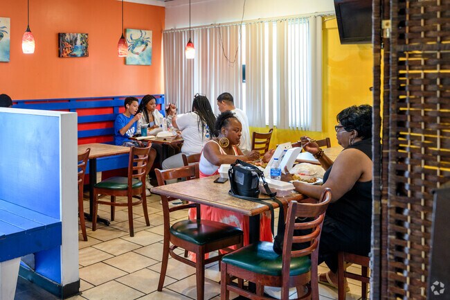 Patrons enjoy some southern cooking at Cookie's Creole n' Soul, located next to Stuart.