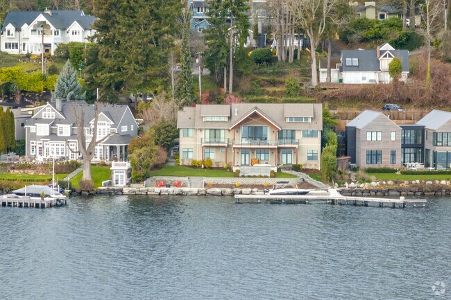 Discover stunning lakefront homes in Island Point with private beaches and large yards.