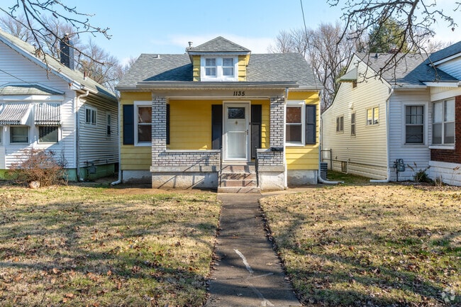 This attractive bungalow adds a splash of bright color to the streets of Germantown.