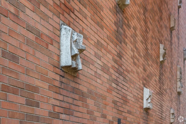 The exterior detail of P.S. 368 features abstract masonry along the brick exterior.