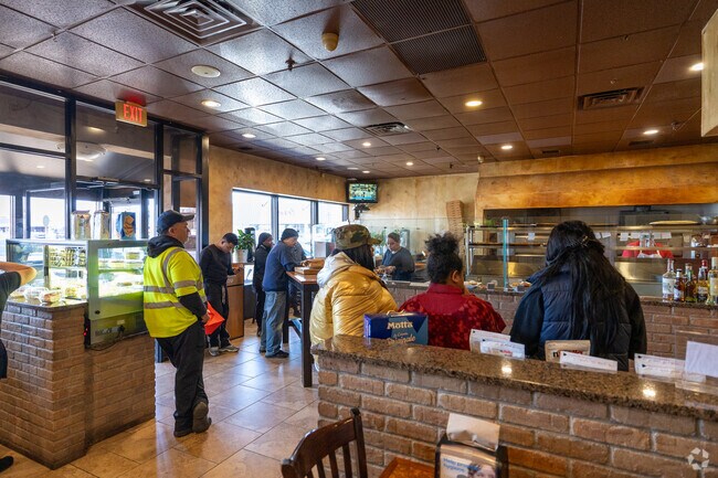 Massimo Pizzeria Ristorante near Boston Ave-Mill Hill is a popular italian eatery for locals.