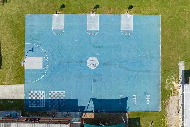 The Orlando Magic basketball court at Three Points Elementary is well loved at the school.